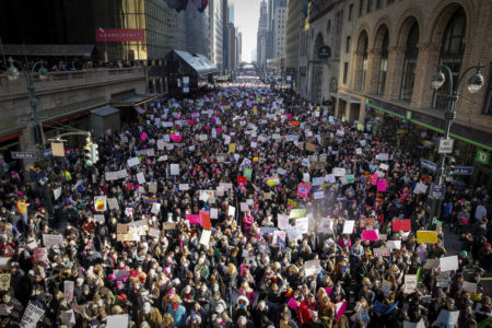 Protestors walk down 42nd Street near Grand Central Terminal during the Women's March in New York City at Dag Hammarskjold Plaza. NYTMARCH                              NYTCREDIT: Nicole Craine for The New York Times